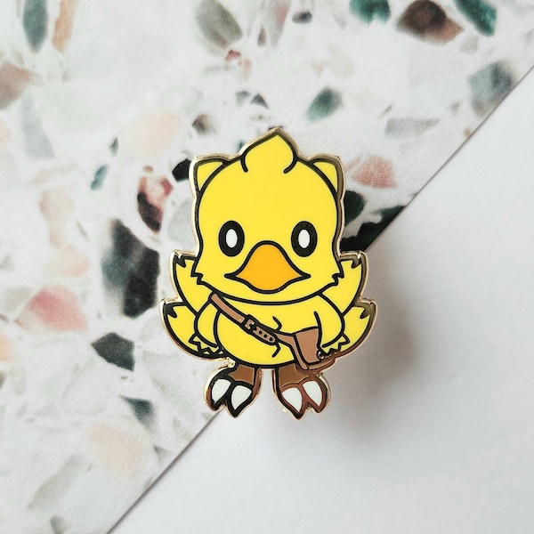 Pin de esmalte de chocobo de viaje