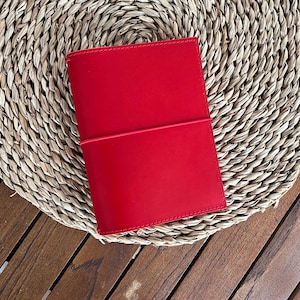 A6 travel notebook, made in red leather with elastic inside, pockets for pencils, cards and papers, notebook and cotton cover as a GIFT.