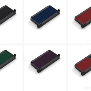 May include: Six ink pads in different colors: black, blue, red, green, purple, and a two-tone red and blue ink pad. The ink pads are rectangular and have a black plastic casing.