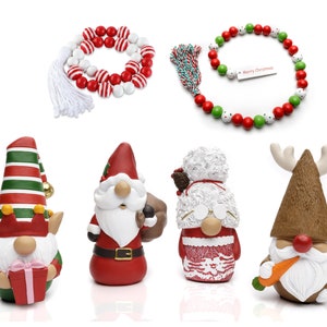 May include: A collection of Christmas decorations, including beaded garlands in red, white, and green, and gnome figurines. The gnomes are in various designs, including an elf, Santa Claus, and a gnome with reindeer antlers.