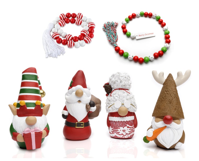May include: A collection of Christmas decorations, including beaded garlands in red, white, and green, and gnome figurines. The gnomes are in various designs, including an elf, Santa Claus, and a gnome with reindeer antlers.