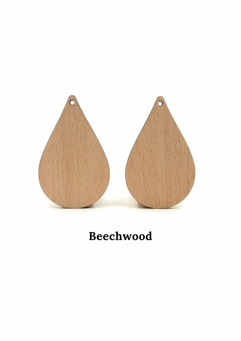 May include: Two teardrop-shaped wooden earring blanks made of beechwood.