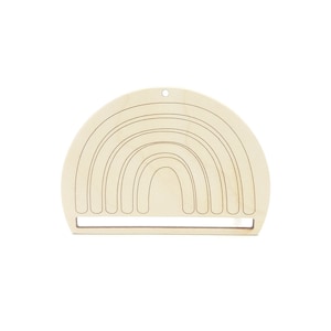 May include: A wooden rainbow wall hanging with a cutout design. The rainbow has five arches and a small hole at the top for hanging.