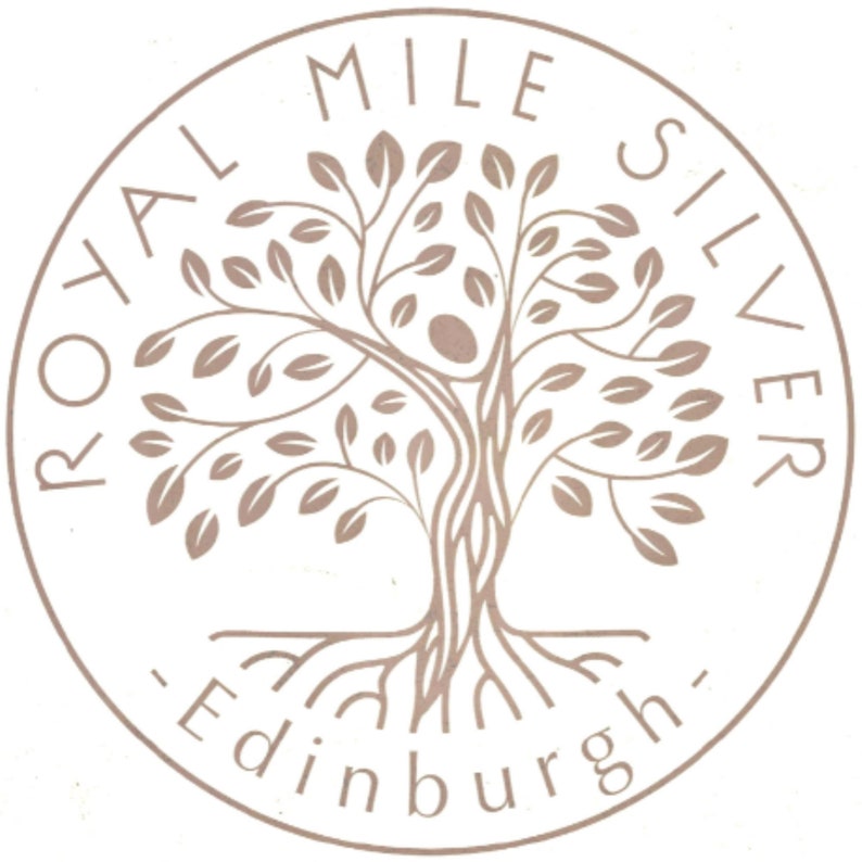 May include: A circular logo with a stylized tree with roots and the text "Royal Mile Silver - Edinburgh" around the tree.