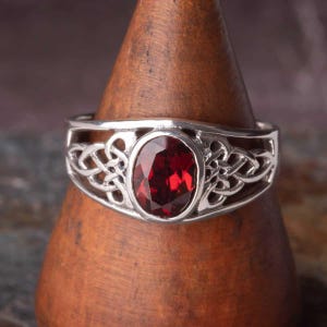 Celtic Garnet ring in Sterling Silver