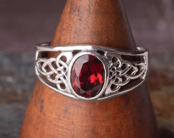 Celtic Garnet ring in Sterling Silver
