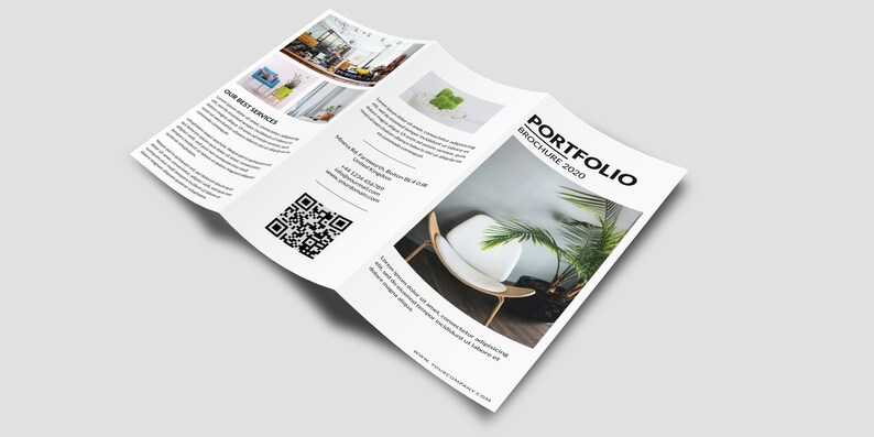 May include: A tri-fold brochure with a white background and black text. The front cover features the word "PORTFOLIO" in a large, bold font, followed by "BROCHURE 2020" in a smaller font. The brochure is folded in thirds, and the front cover is visible. The brochure is lying on a white surface.