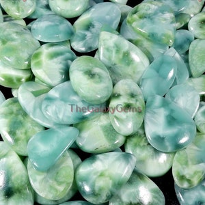Hemimorfiet edelsteen. Larimar-patroon hemelsblauwe hemimorfiet. Hemimorfiet cabochon. Hemimorfiet bulk groothandel partij los. Tot 5000 cts