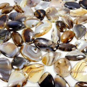 Montana-agaat edelsteen. Geel Montana-kavel. Natuurlijke Montana-agaatcabochon. Montana Crystal groothandel bulkpartij voor sieraden. Tot 5000 cts