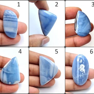 Blauwe Owyhee-opaal edelsteen. Bio Color Blue Owyhee Opal. Natuurlijke Owyhee blauwe opaal cabochon. Groothandel Owyhee Opal Los. Variatie OPM-A