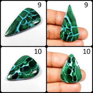May include: Four green and blue malachite cabochons, two are teardrop shaped and two are pear shaped. The cabochons are displayed on a white background.