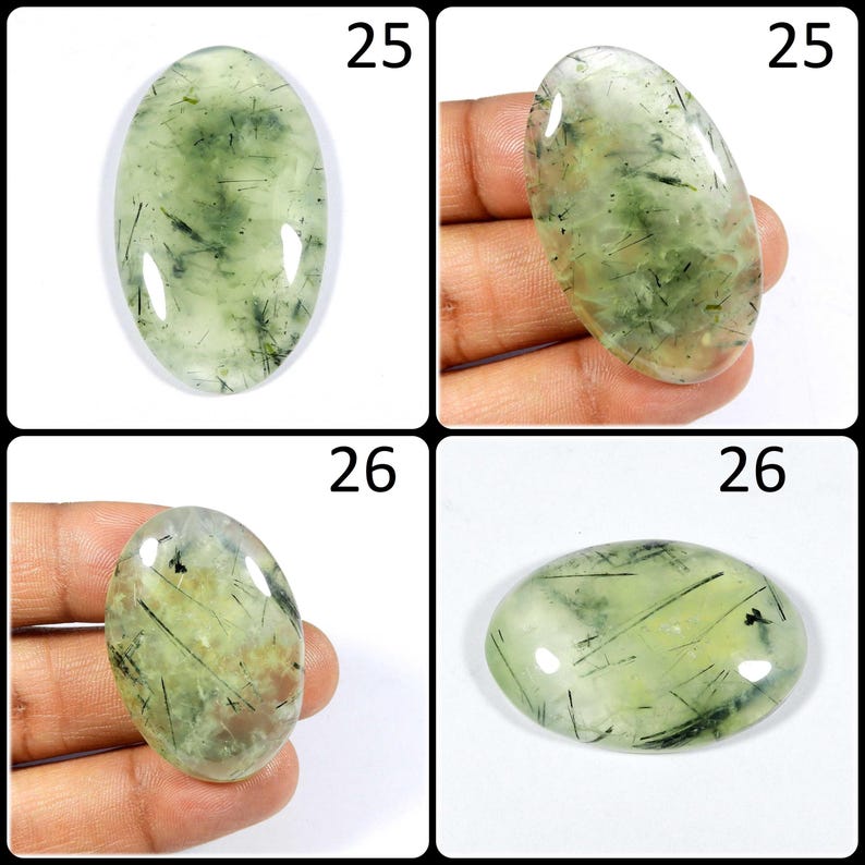 May include: Four oval-shaped green and black gemstone cabochons, each with a unique pattern of inclusions. The cabochons are labeled with the numbers 25 and 26.