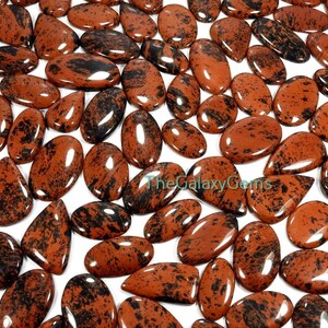 Rode mahonie obsidiaan edelsteen. Mahonie obsidiaan cabochon. Natuurlijke mahonie obsidiaan groothandel bulkpartij. Mahoniekristal tot 5000 ct.