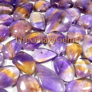 Ametrien. Geelpaarse ametrien. Natuurlijke bio-kleur ametrien cabochon. Ametrische edelsteen. Gepolijst ametrien bulkgroothandelspartij tot 5000 cts