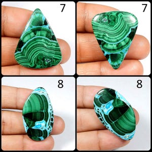 May include: Four green and blue gemstone cabochons, two in a triangle shape and two in an oval shape. The cabochons are set in a hand for size reference.