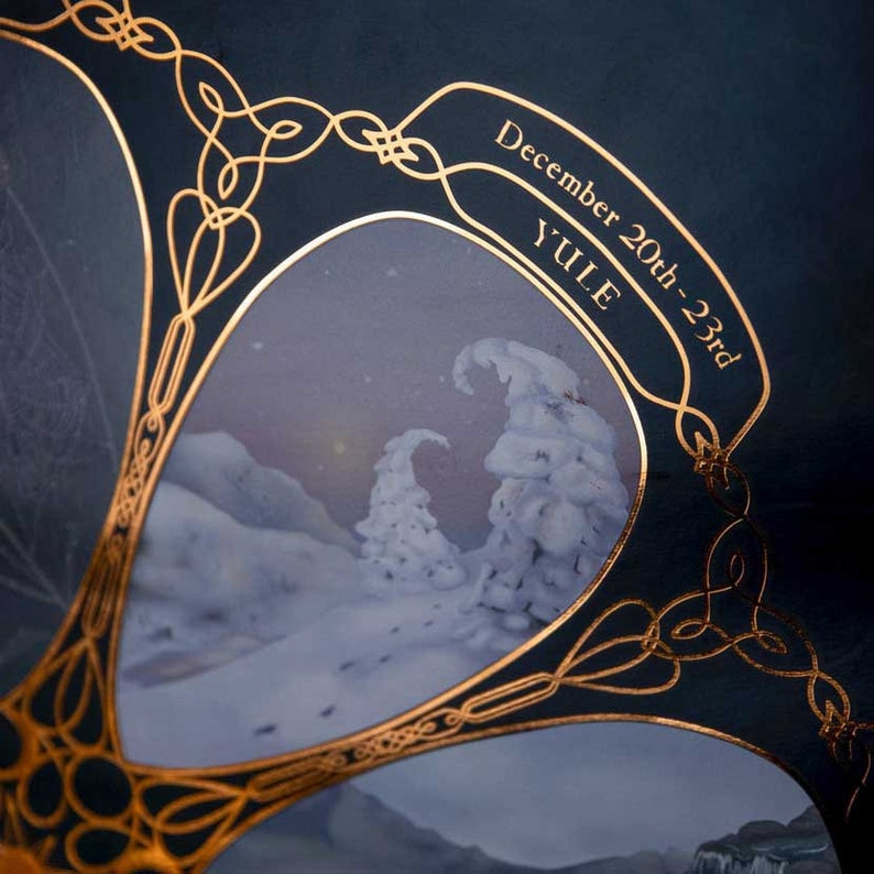 May include: A gold-trimmed, circular image with a winter scene. The image shows snow-covered trees and a snowy landscape. The text "December 20th-23rd YULE" is written in gold lettering.