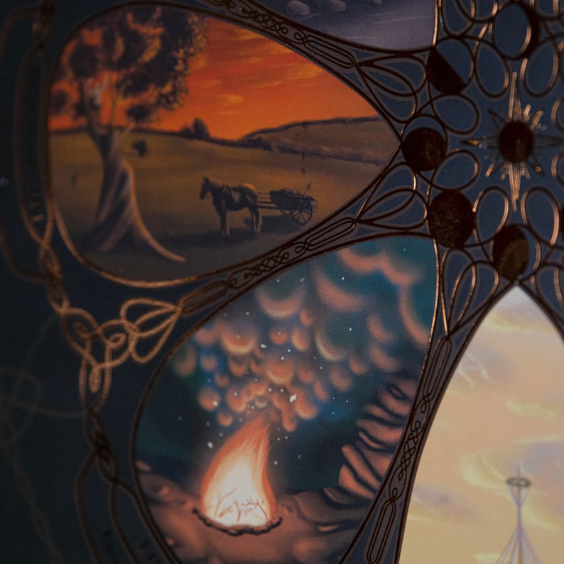 May include: A circular design with a gold border and intricate patterns. The design is divided into sections, each featuring a different scene. One section shows a sunset over a field with a horse and cart, another shows a campfire with smoke rising, and another shows a cloudy sky with stars.