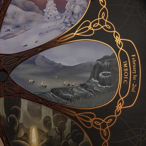 May include: A black and gold circular design with a Celtic knot pattern. The design features a scene of a waterfall and sheep in a landscape. The text "February 1st-2nd IMBOLC" is written in gold lettering.
