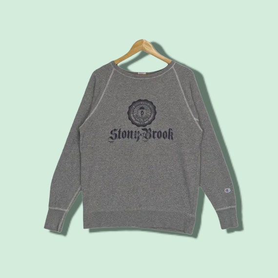 Champion sweater shop academy que es