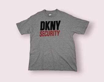 Vintage 90's DKNY Security Big Spell Out Logo T-Shirt Vintage Dkny Tee Single Stitches Tee Made In Usa Donna Karan Grey Size Large