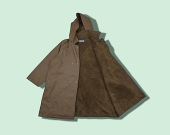 May include: A brown hooded jacket with a fleece lining. The jacket has a double-breasted closure and two pockets.