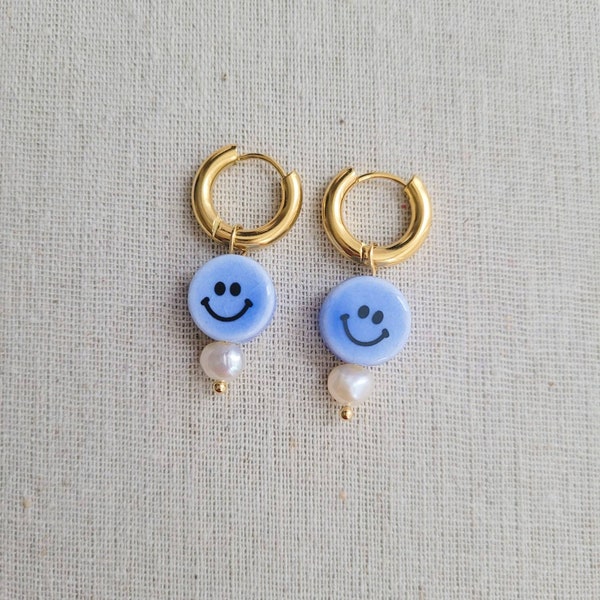 Blue mini smiley freshwater pearl golden hoop earrings | Golden Huggie Hoop earrings