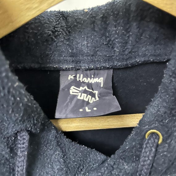 Sudadera con capucha polar Uniqlo x Keith Haring, talla mediana