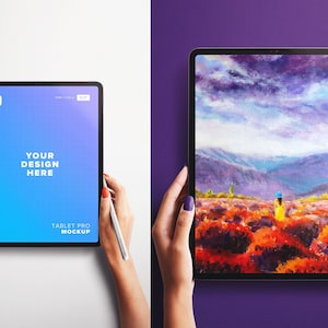 May include: A mockup of a tablet computer with a blue gradient background and the text "YOUR DESIGN HERE" and "TABLET PRO MOCKUP". The tablet is being held by a person's hands.