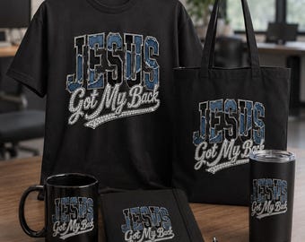 May include: A black t-shirt, tote bag, ceramic mug, notebook, and tumbler, each featuring the text "JESUS Got My Back" in blue and white lettering. The items are arranged together, showcasing a consistent design across various everyday products.