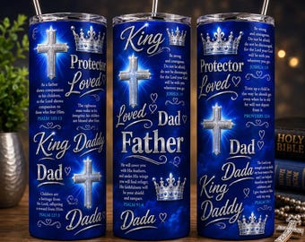 May include: Three cylindrical blue tumblers with silver metal straws, featuring silver cross and crown graphics, white script text including King, Protector, Loved, Dad, Father, Dada, and Bible verses like Joshua 1:9, Psalm 103:13, and Psalm 91:4.