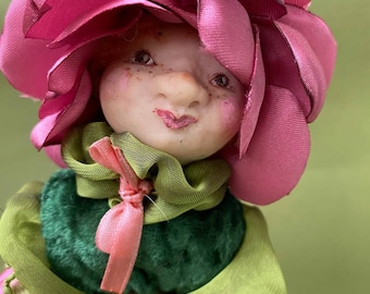 Doll. Interior doll. Collectible doll. Rose doll.