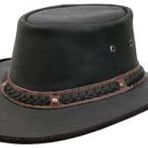 May include: A black leather cowboy hat with a braided leather band and a wide brim.