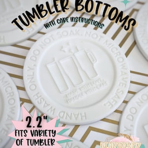 May include: White self-adhesive tumbler bottoms with care instructions. The image shows several round bottoms with the text "SELF ADHESIVE TUMBLER BOTTOMS" and "2.2" FITS VARIETY OF TUMBLER SIZES".
