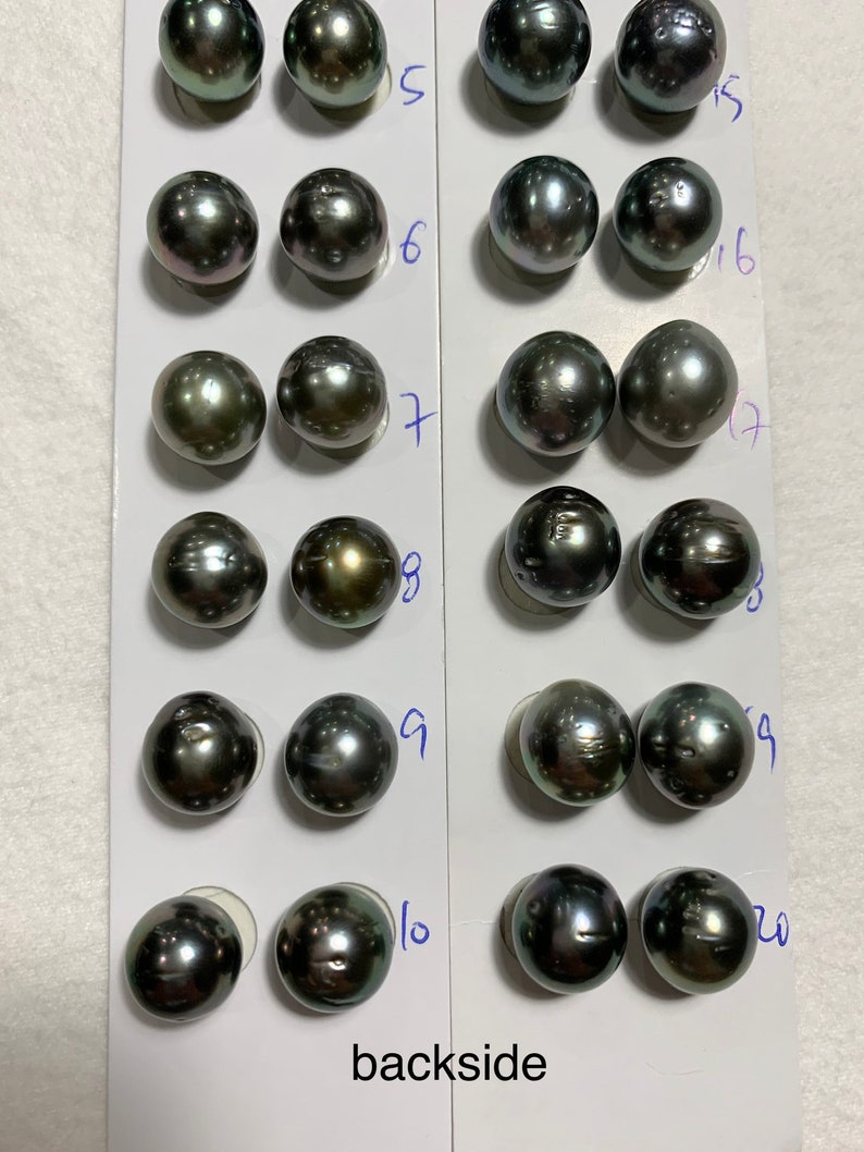 has blemishes 11-12 MM High Luster Natural Color with PeacockGreenGrey Tahitian Cultured pearl sold by pair Tahitian pearls