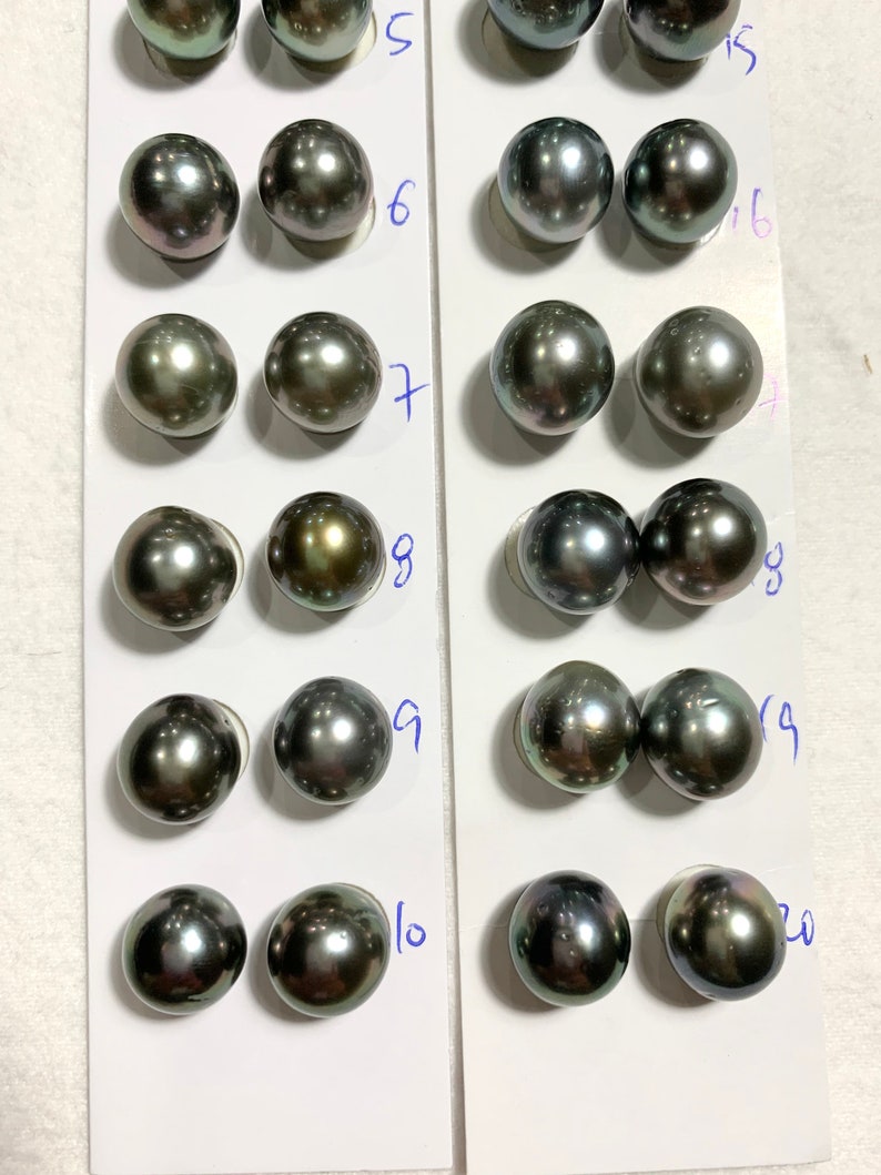 has blemishes 11-12 MM High Luster Natural Color with PeacockGreenGrey Tahitian Cultured pearl sold by pair Tahitian pearls