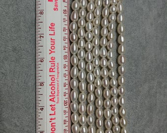 Perlas cultivadas de agua dulce blancas de alto brillo AAA de 8,5-9,5 mm (perlas sueltas en forma de lágrima, arroz y ovaladas), venta al por mayor.