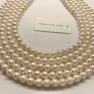6.5-7.0 mm White AA Japanese Akoya Cultured Pearl, 16&quot;, Pearl has blemishes, Ivory tone, string to 18&quot; with knots clasp, Price per strand
