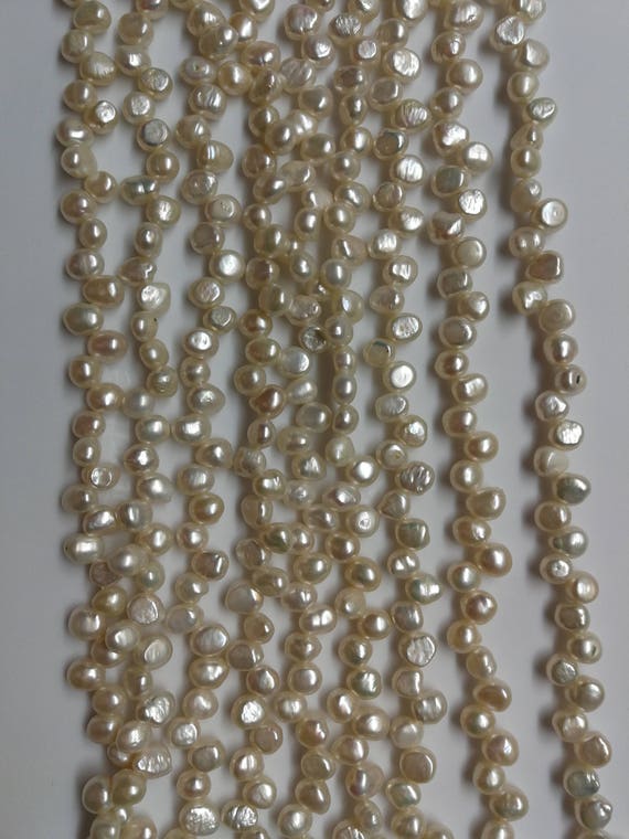 Zigzag Pearls- 7-8mm AA+ White Baroque Freshwater Cultured Pearls
