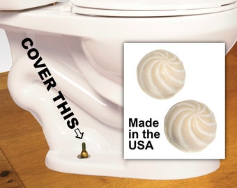 Sea shell ceramic toilet caps in a beige and opalescent white glaze, set of 2