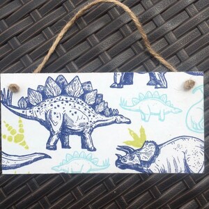 Handmade decoupaged wooden dinosaurs nursery decoration