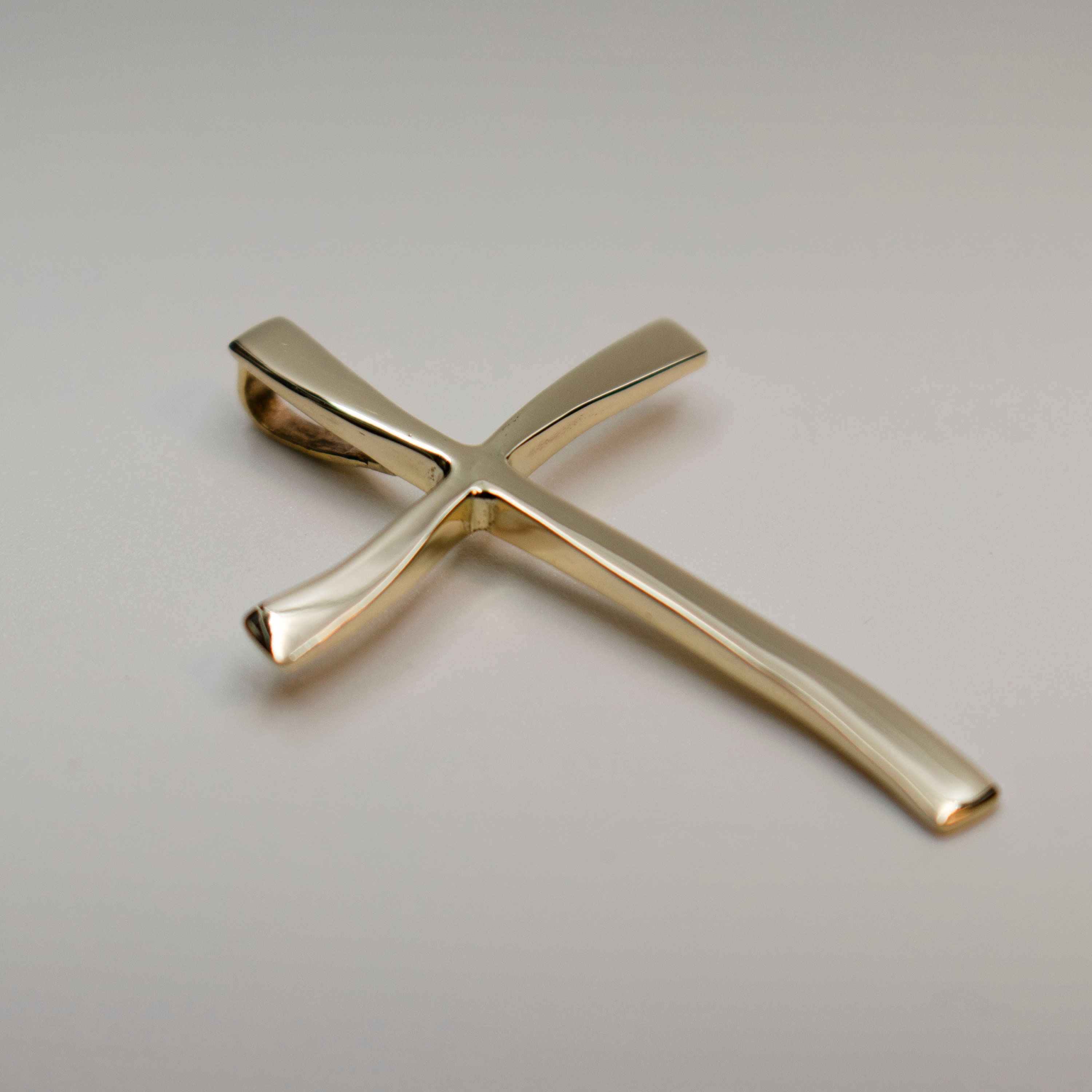 18 K Gold Cross Pendant This Glowing Cross Pendant Offers a