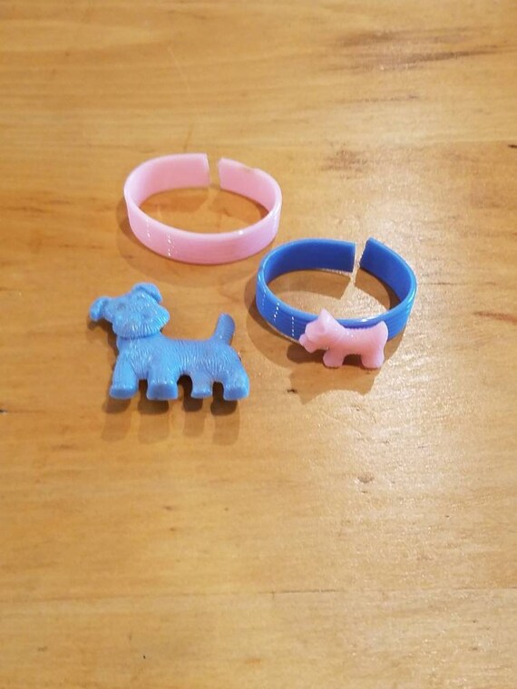 Vintage  dog plastic items.  pink and blue plastic