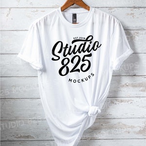 May include: White t-shirt mockup with a black graphic design that says "Studio 825" and "EST. 2019" above the text and "Mockups" below the text.