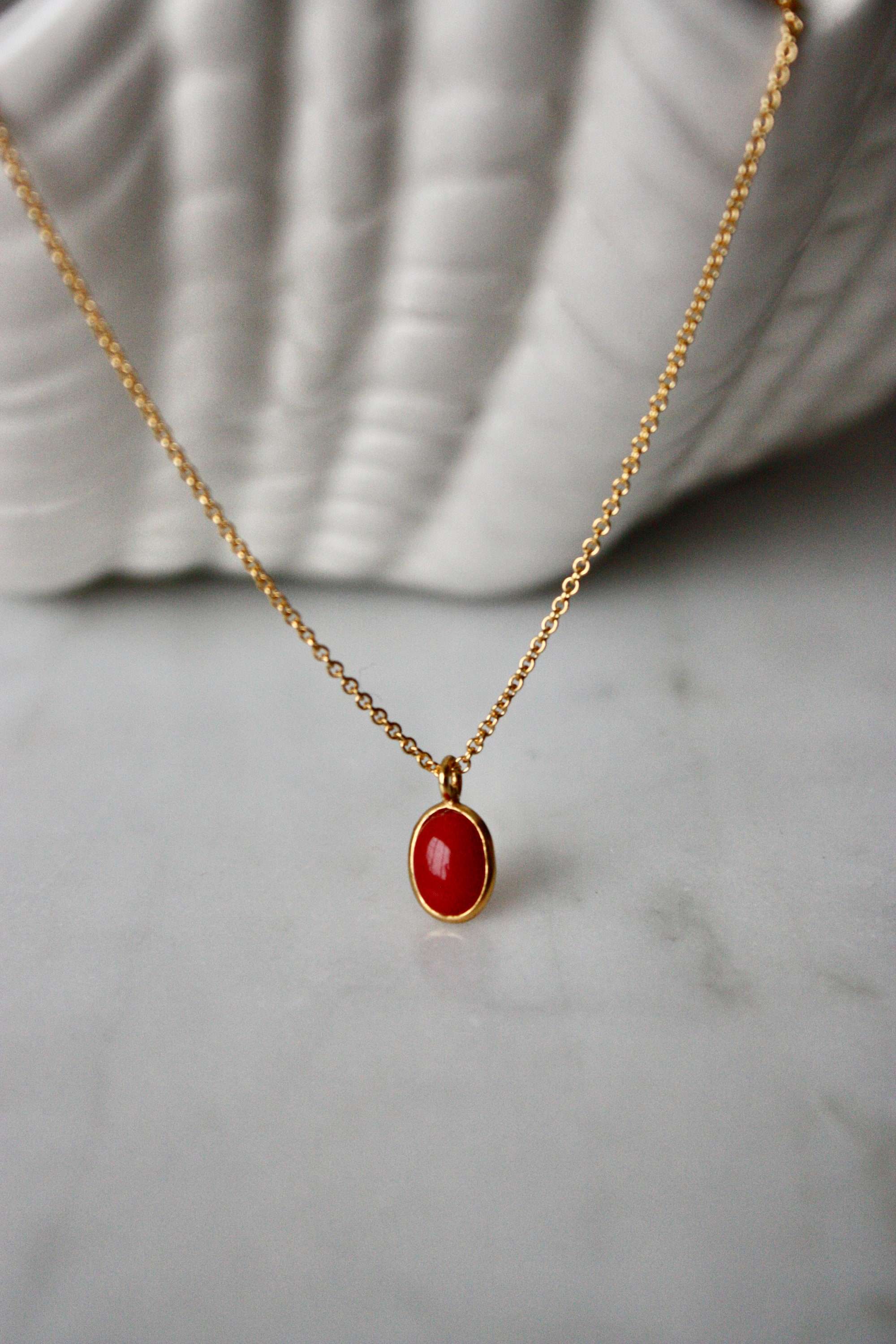 Gold coral pendant deals