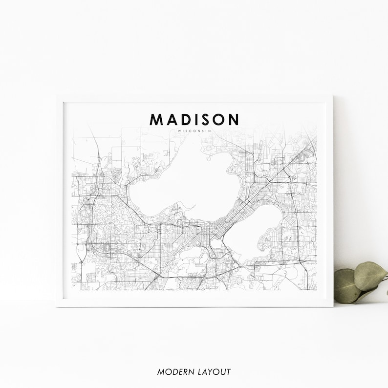 May include: A black and white map of Madison, Wisconsin, with the city name and "MODERN LAYOUT" text at the bottom.