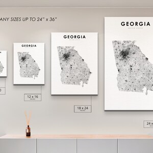 May include: Four different sizes of a black and white print of the state of Georgia with the text "GEORGIA" and "United States" at the top. The print sizes are 8 x 10 inches, 12 x 16 inches, 18 x 24 inches, and 24 x 36 inches.