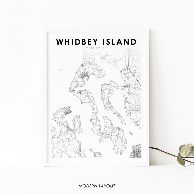 May include: Black and white map print of Whidbey Island, Washington. The map shows the roads and waterways of the island. The title "Whidbey Island, Washington" is at the top of the map. The words "Modern Layout" are at the bottom of the map.