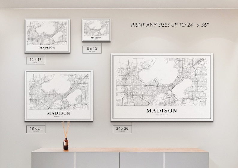 May include: A black and white map print of Madison, Wisconsin, showing the city's streets and lakes. The print is available in various sizes, up to 24 inches by 36 inches.