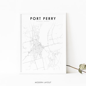 May include: A black and white map print of Port Perry, Ontario, Canada. The map shows the city's streets and waterways. The title "PORT PERRY" is printed in bold, black letters at the top of the map. The words "ONTARIO, CANADA" are printed in smaller, black letters below the title. The words "MODERN LAYOUT" are printed in black letters at the bottom of the map.