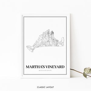 May include: Black and white line art map print of Martha's Vineyard, Massachusetts. The print has a white background and a black frame.